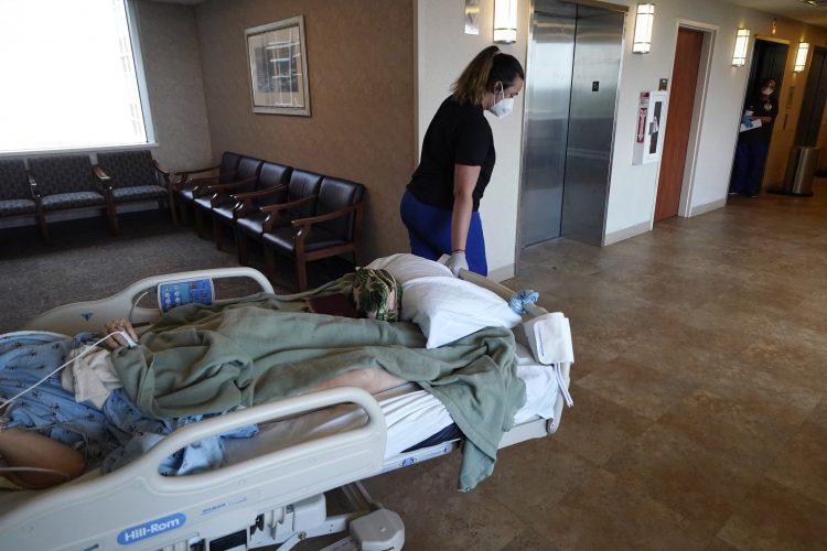COVID case counts may be losing importance amid omicron